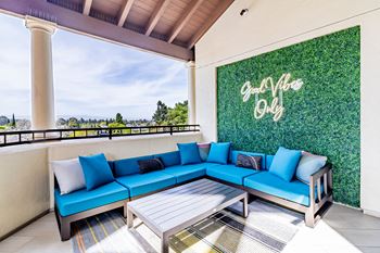 Sky deck with soft seating, televisions and bar - perfect for entertaining